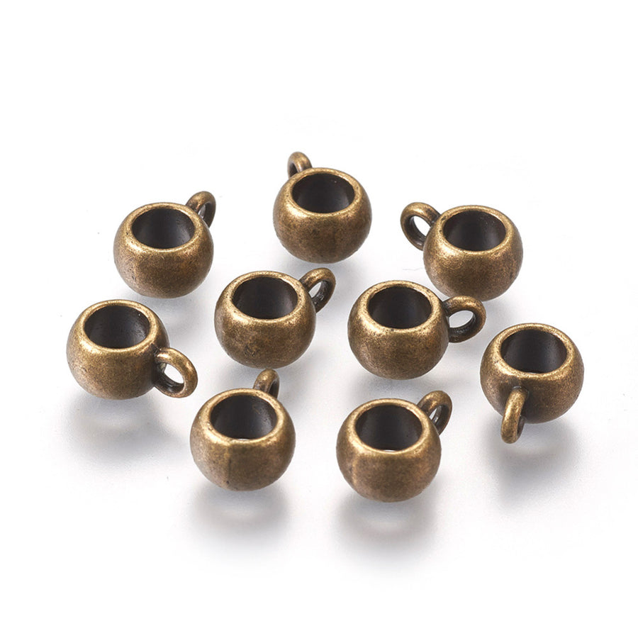 Alloy Tube Bail Beads, Antique Bronze color Hanger Links  for Jewelry Making.  Size: 8mm Diameter, 5mm Thick, Hole: 2mm, Quantity: 10pcs/bag.  Material: Alloy (Lead, Cadmium& Nickel Free) Connectors, Bail Beads. Bronze Color.