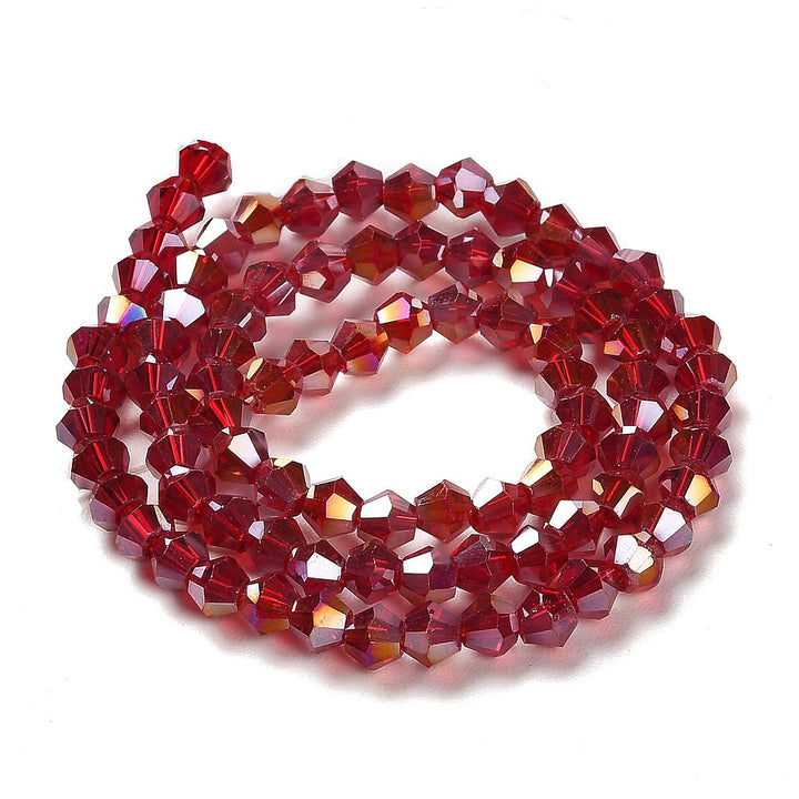 AB Color Plated Glass Beads, Faceted, Red Color, Bicone, Crystal Beads for Jewelry Making.
Size: 4mm Length, 4mm Width, Hole: 1mm; approx. 92pcs/strand, 13.75" inches long.
Material: Electroplated, AB Color Plated Austrian Crystal Imitation Glass Crystal Beads, Bicone, Red Colored Beads. Polished, Shinny Finish. 