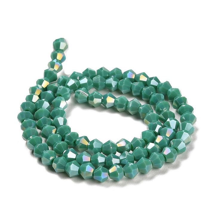 Opaque Glass Beads, Faceted, AB Color Plated Turquoise Color, Bicone, Glass Crystal Beads for Jewelry Making. 
Size: 4mm Length, 4mm Width, Hole: 1mm; approx. 92pcs/strand, 13.75" inches long.
Material: Solid Color Electroplated Crystal Imitation Glass Beads, Rondelle, Opaque Turquoise Colored Beads. Polished, Shinny Finish. 