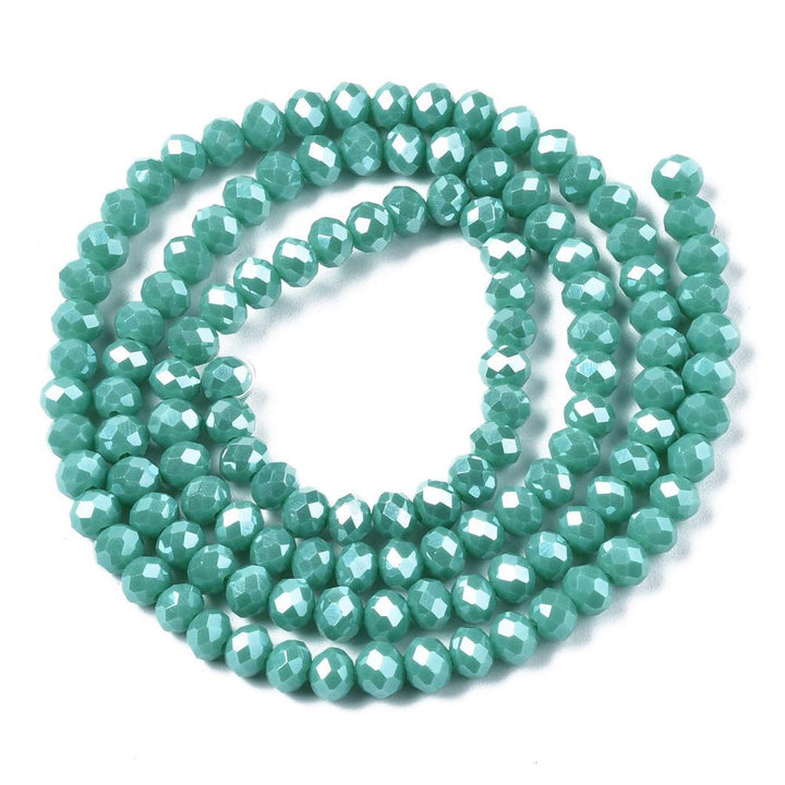 Opaque Glass Beads, Faceted, Pearl Luster Plated Turquoise Color, Bicone, Glass Crystal Beads for Jewelry Making.
Size: 4mm Length, 4mm Width, Hole: 1mm; approx. 92pcs/strand, 13.75" inches long.
Material: The Beads are Made from Glass. Electroplated Crystal Imitation Glass Beads, Bicone, Opaque Turquoise Colored Beads. Polished, Shinny Finish. 