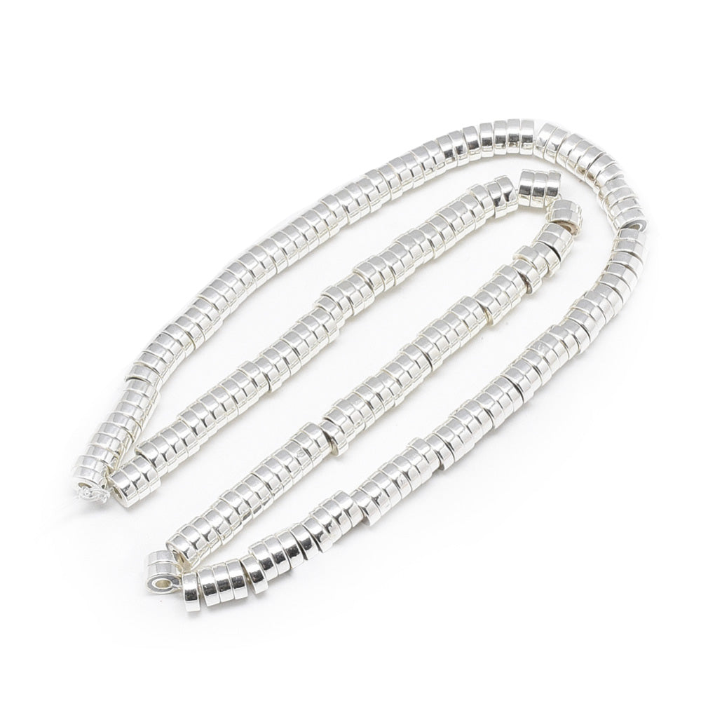 Flat Disc Shaped Electroplated Non-Magnetic Synthetic Hematite Beads, Silver Color. Semi-Precious Stone Spacer Beads for Jewelry Making. These spacers work great with polymer clay heishi beads.  Size: 6mm Wide, 2mm Thick, Hole: 2mm, approx. 170-175pcs/strand, 15.5" Inches Long.  Material: Non-Magnetic Synthetic Heishi Hematite Beads. Platinum Silver Color Plated. Flat Disc Shape. Polished, Shinny Metallic Lustrous Finish.