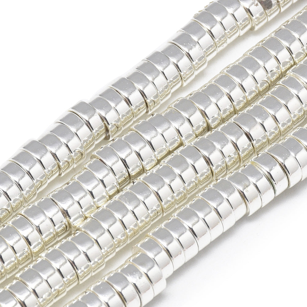 Flat Disc Shaped Electroplated Non-Magnetic Synthetic Hematite Beads, Silver Color. Semi-Precious Stone Spacer Beads for Jewelry Making. These spacers work great with polymer clay heishi beads.  Size: 6mm Wide, 2mm Thick, Hole: 2mm, approx. 170-175pcs/strand, 15.5" Inches Long.  Material: Non-Magnetic Synthetic Heishi Hematite Beads. Platinum Silver Color Plated. Flat Disc Shape. Polished, Shinny Metallic Lustrous Finish.