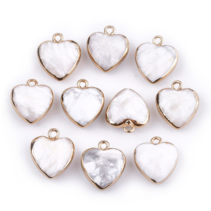 Faceted White Howlite Heart Charms, White Color with Gold Plated Findings. Semi-precious Gemstone Pendant for DIY Jewelry Making.  Size: 16-17mm Length, 14-15mm Wide, 6-7mm Thick, Hole: 1.8mm, 1pcs/package.   Material: Genuine Natural Howlite Stone Pendant, Gold Toned Findings. Heart Shaped Stone Pendants. Polished Finish.