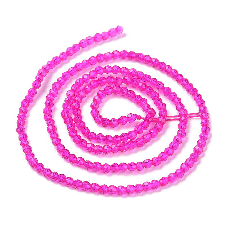 Faceted Glass Crystal Beads, Round, Transparent Magenta Pink Color Beads.

Sizes

2mm in Diameter, Hole: 0.7mm; approx. 150-165pcs/strand, 13" inches long.

Material: Transparent Faceted, Round, Magenta Color&nbsp;Glass Crystal Beads.