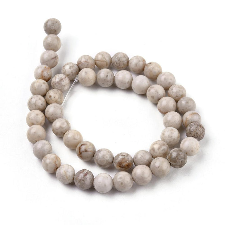 Natural Maifan Stone Beads, Round, Cream Color. Fossil Gemstone Beads for DIY Jewelry Making.   Size: 10mm Diameter, Hole: 1mm; approx. 37-38pcs/strand, 15" Inches Long.  Material: Natural Maifanite/Maifan Stone Beads. Fossilized. Greyish Cream Color with Brown Markings. Polished Finish.