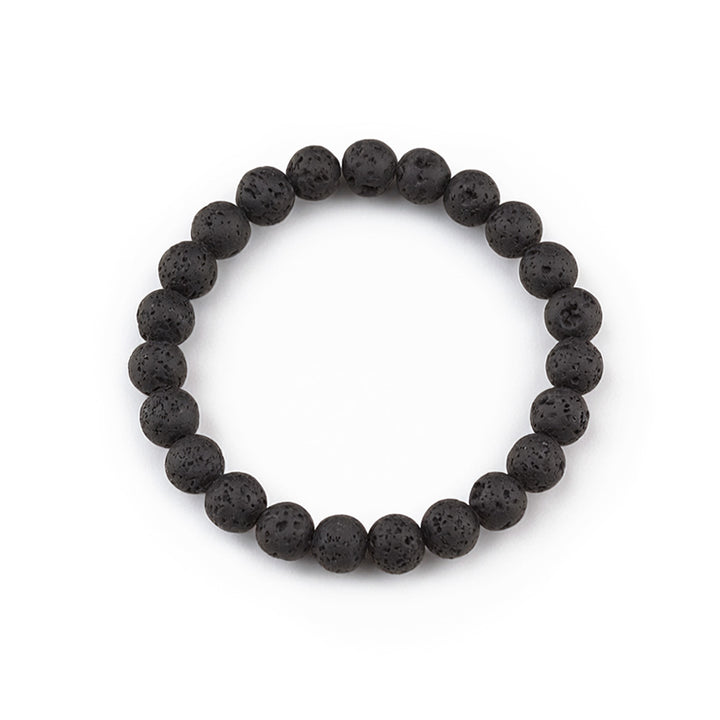 Black lava rock gemstone bracelet featuring 8mm beads in a timeless unisex design suited for both men and women. The natural volcanic stone brings grounding energy and emotional stability to the wearer, known in crystal traditions for promoting strength, courage, and calm during times of change. Lava rock&