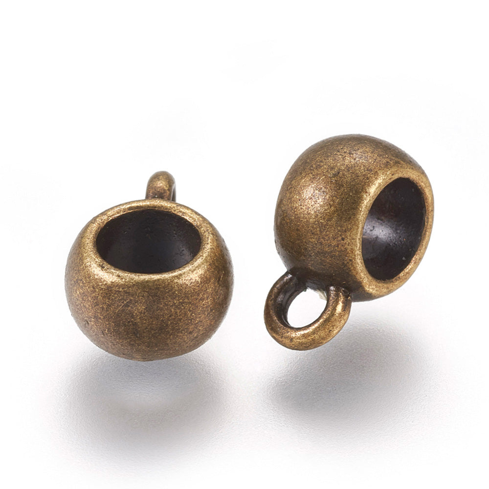 Alloy Tube Bail Beads, Antique Bronze color Hanger Links  for Jewelry Making.  Size: 8mm Diameter, 5mm Thick, Hole: 2mm, Quantity: 10pcs/bag.  Material: Alloy (Lead, Cadmium& Nickel Free) Connectors, Bail Beads. Bronze Color. 