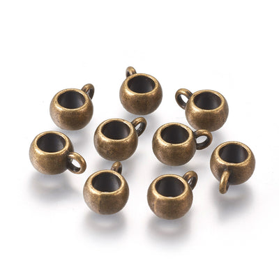 Alloy Tube Bail Beads, Antique Bronze color Hanger Links  for Jewelry Making.  Size: 8mm Diameter, 5mm Thick, Hole: 2mm, Quantity: 10pcs/bag.  Material: Alloy (Lead, Cadmium& Nickel Free) Connectors, Bail Beads. Bronze Color. 