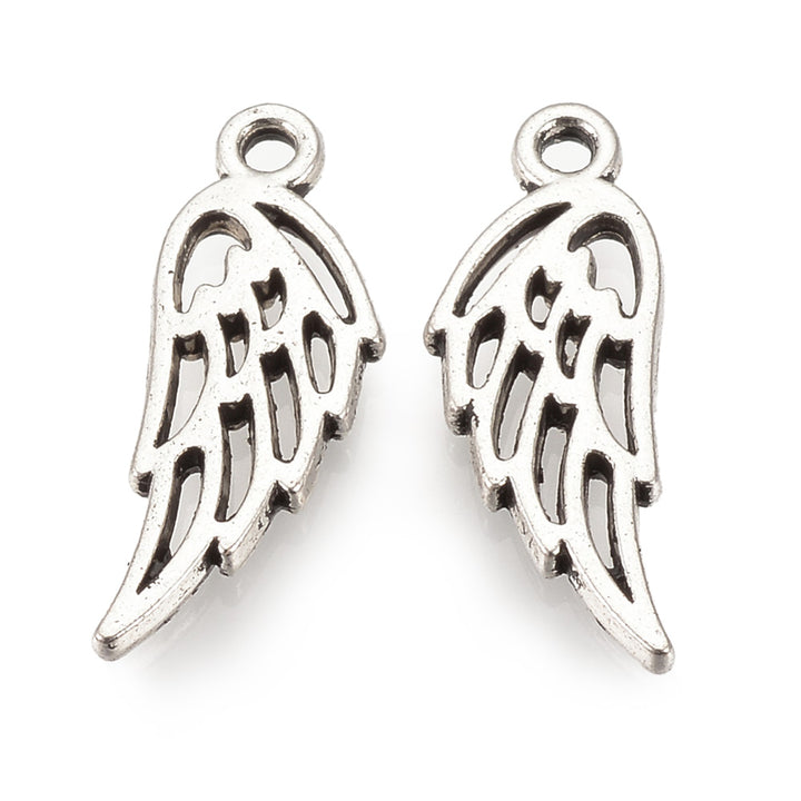 Alloy Angel Wing Charms, Antique Silver Colored Wings Charm for DIY Jewelry Making.   Size: 13mm Length, 5mm Width, 1.5mm Thick, Hole: 1mm, Quantity: 10 pcs/package.  Material: Alloy (Lead and Cadmium Free) Wings Charms. Antique Silver Color. Shinny Finish.