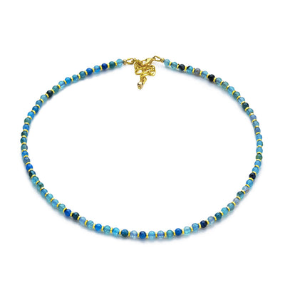 4mm Blue Agate Crackle beads and 2mm gold plated hexagon shaped Hematite disc beads, its delicate feminine and is sure to compliment your outfit. Hand strung with  gold  plated  jewelry findings and a 2" extender. 16" long necklace featuring multi color blue crackle beads complimented with gold shine.  Size: 16" Inch Necklace with 2" Extender Featuring 4mm Gemstone beads and 2mm Spacers.  Material: Natural Crackle Agate Gemstone, Gold plated Hematite and Alloy.