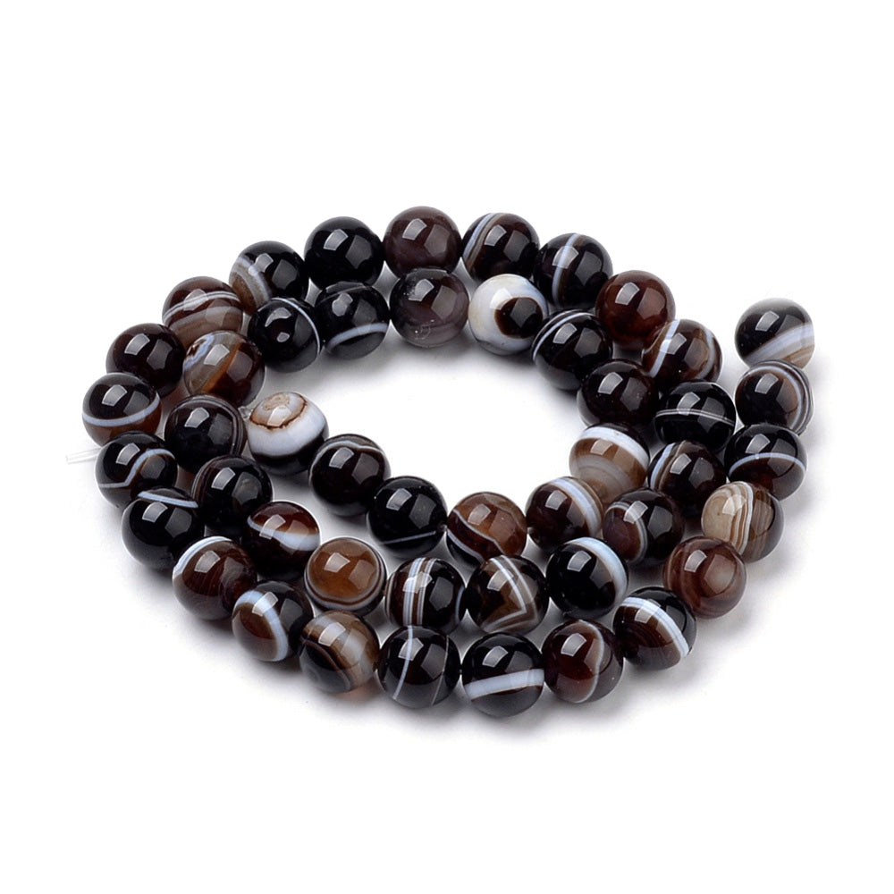 Coconut Brown Striped Banded Agate Beads, Round, dyed Coconut Brown Agate. Semi-Precious Gemstone Beads for Jewelry Making.   Available Sizes:  4mm Diameter, Hole: 1mm; approx. 85-90pcs/ strand, 14.5" Inches Long.  6mm Diameter, Hole: 1mm; approx. 60-63pcs/ strand, 14.5 Inches Long.  8mm Diameter, Hole: 1mm; approx. 44-47pcs/ strand, 14.5 Inches Long.  10mm Diameter, Hole: 1mm; approx. 35-37pcs/ strand, 14.5 Inches Long.  Material: Striped Banded Agate Loose Beads Dyed Brown Color. Polished, Shinny Finish.
