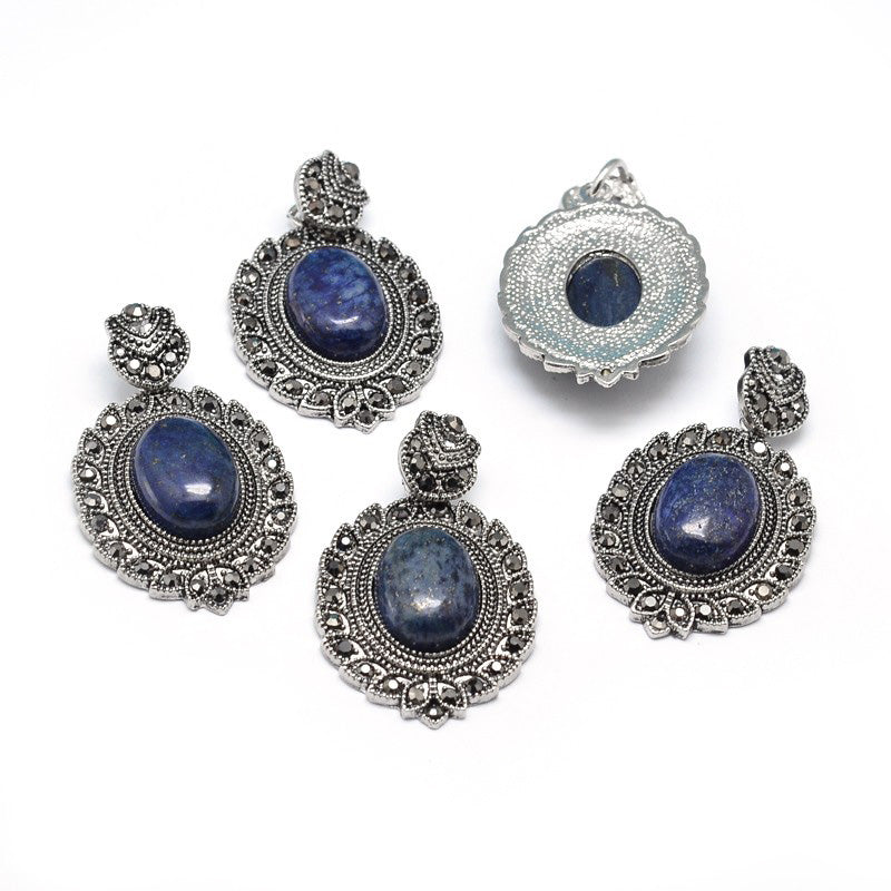 Alloy Antique Silver Rhinestone Gothic Lapis Lazuli Gemstone Pendants, Blue Color. Semi-precious Stone Goth Pendant for DIY Jewelry Making. Goth Style Jewelry Findings.  Size: 45-47mm Length, 25-27mm Width, 7.5-9mm Thick, Hole: 5x7mm, Qty: 1pcs/package.  Material: Natural Lapis Lazuli Stone Pendant Alloy and Rhinestone Findings. (Lead, Cadmium and Nickel Free Alloy Gothic Pendants.