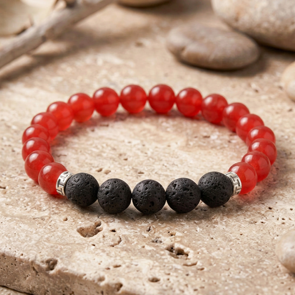 This vibrant beaded gemstone bracelet showcases 8mm round Red Jade and 8mm round Lava Rock beads.