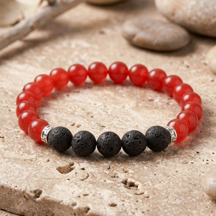 This vibrant beaded gemstone bracelet showcases 8mm round Red Jade and 8mm round Lava Rock beads.
