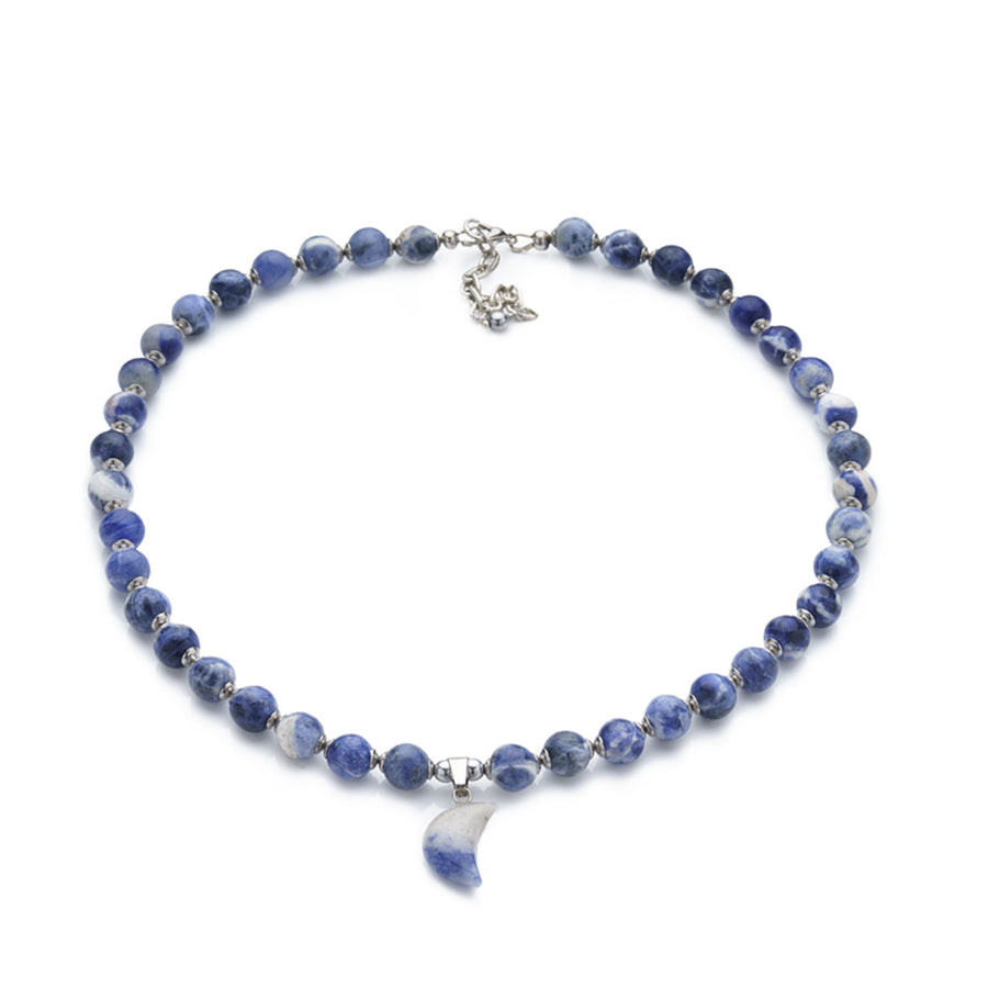 Look beautiful and feel powerful with this Sodalite Beaded Gemstone Necklace with its mesmerizing moon-shaped gemstone pendant. Crafted with 8mm blue Sodalite beads and16-inch length, it's the perfect way to showcase your unique style and express yourself.  Size: 16" Length with 2" Chain Extender. 8mm Gemstone Beads.  Material: Natural Sodalite & Blue Spot Jasper with Platinum Colored Stainless Steel Spacers. 