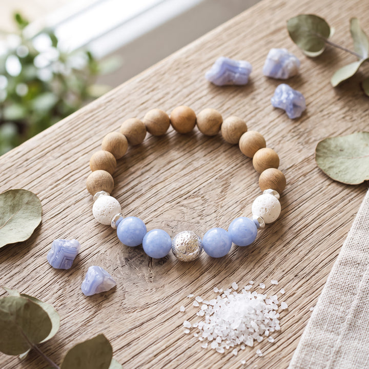 Chunky BOHO Beaded Bracelet 7.5 inches of calming style. Hand-strung with 10mm Aqua Jade gemstone beads, natural white and burlywood lava stone, silver accents, and hematite rondelles for grounding energy. 