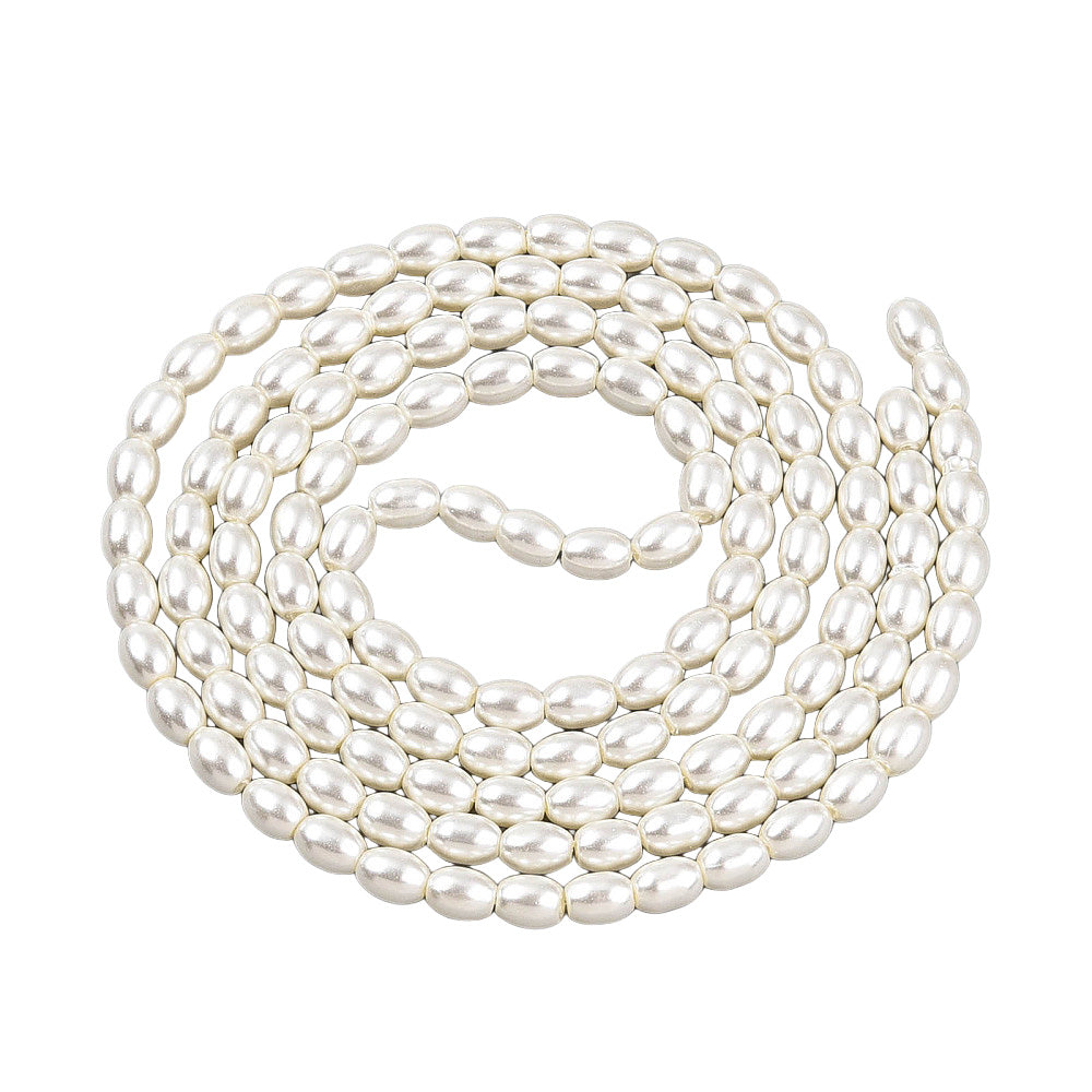 Rice Pearls, Glass Pearl Beads, Oval, Creamy White Color Pearls Beads for Jewelry Making.

Size: 6mm Length, 4-4.5mm With, Hole: 0.9mm, approx. 132pcs/strand, 30 inch/strand.

Material: The Beads are Made from Glass. Creamy White Color, Pearlized, Shinny Finish.