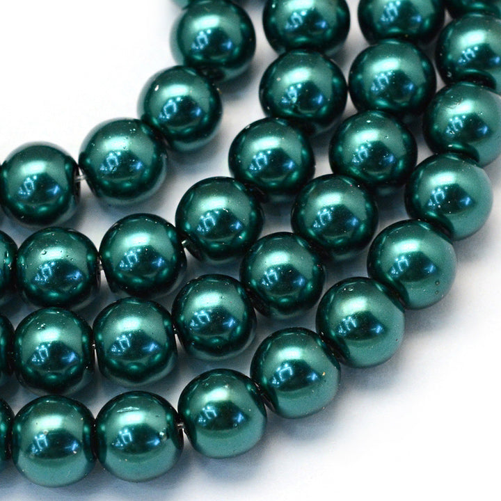 Glass Pearl Beads, Round, Teal Greeen Color Pearls Beads for Jewelry Making.

Size: 4-4.5mm in diameter, hole: 0.8mm, approx. 200-210pcs/strand, 32 inches/strand

Material: The Beads are Made from Glass. Teal Green&amp;nbsp;Color, Polished, Shinny Finish