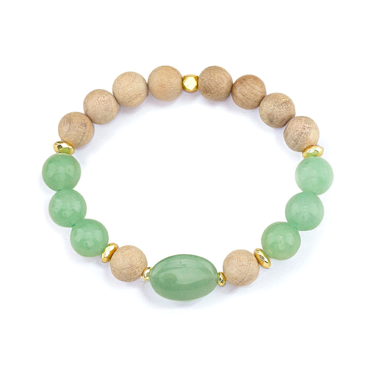 A harmonious blend of earthy natural wood grain and vibrant green aventurine, finished with gleaming gold-tone hematite accents and an elegant oval focal stone.

Featuring a balance of rich, textured burlywood beads and smooth green aventurine, this piece pairs warm organic tones with the refreshing quartz hues of natural stone.

At the center sits a polished 17×10mm oval green aventurine focal bead, flanked by metallic gold-plated hematite spacer accents that catch the light with every movement. Built on a