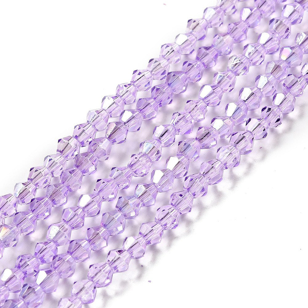 AB Color Plated Glass Beads, Faceted, Lilac Color, Bicone, Crystal Beads for Jewelry Making.

Size: 4.5mm Length, 4mm Width, Hole: 1mm; approx. 92pcs/strand, 13" inches long.

Material: Electroplated, AB Color Plated Austrian Crystal Imitation Glass Crystal Beads, Bicone, Lilac Purple Colored Beads. Polished, Shinny Finish.&nbsp;