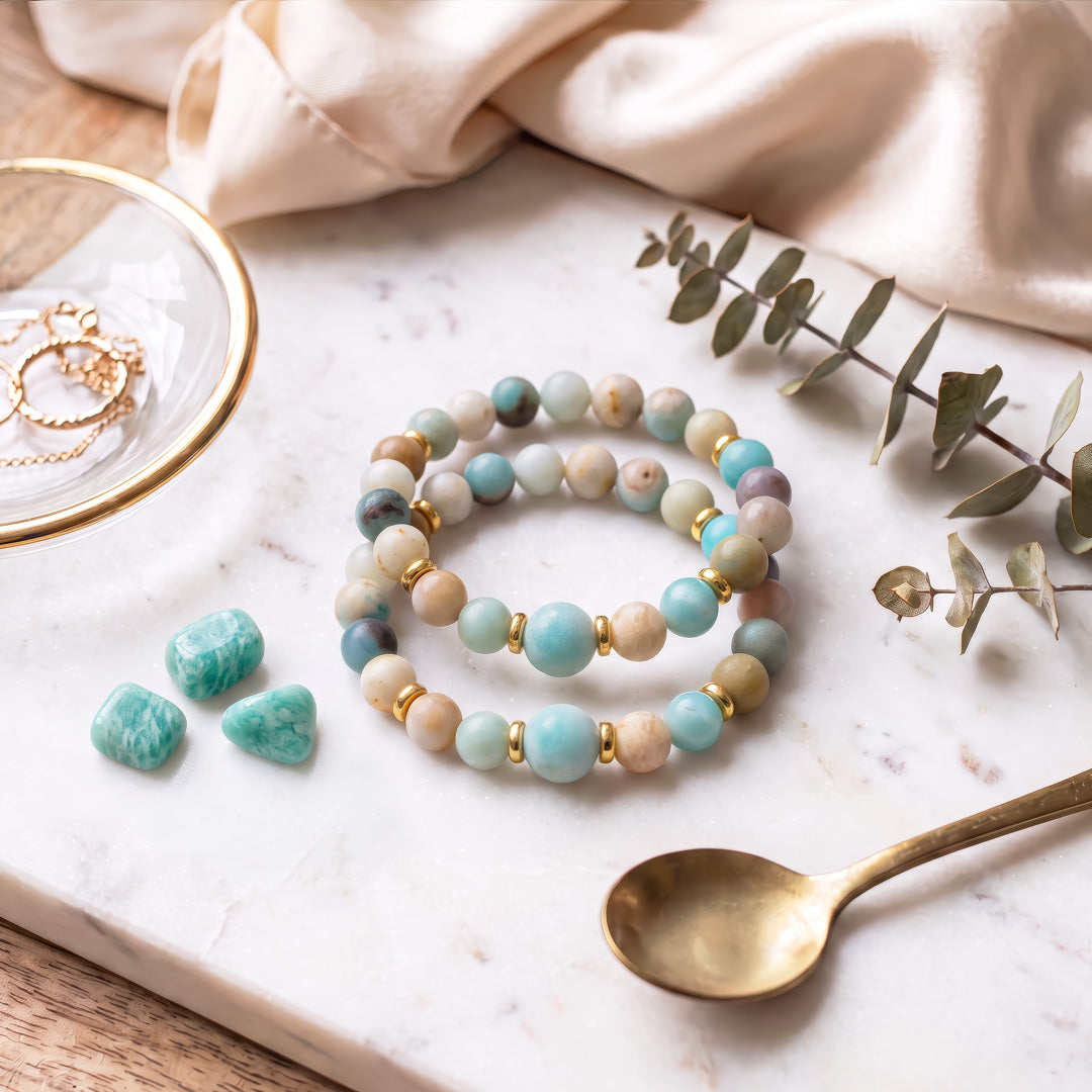 This matte beaded gemstone bracelet features; 8mm and 10mm round Amazonite natural stone beads. 