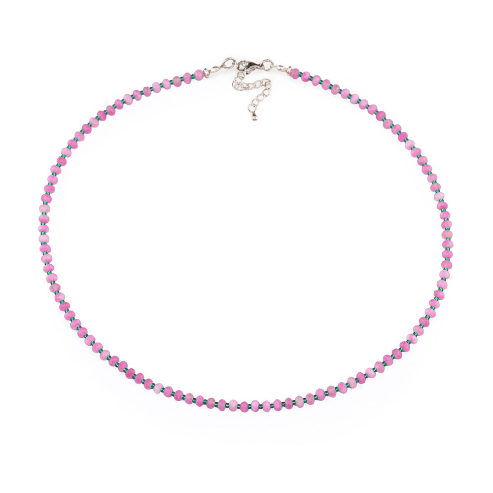 Stylish beaded gemstone necklace featuring 4x3mm pink and white jade rondelle beads paired with size 11/0 Czech seed beads in turquoise green. Perfect for everyday wear or evening occasions, and makes a thoughtful gift for friends and family. Includes a 2" chain extender and silver lobster clasp for secure fastening and adjustable fit.