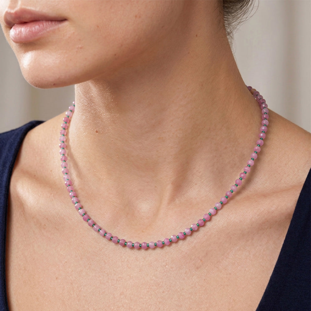 Stylish beaded gemstone necklace featuring 4x3mm pink and white jade rondelle beads paired with size 11/0 Czech seed beads in turquoise green. Perfect for everyday wear or evening occasions, and makes a thoughtful gift for friends and family. Includes a 2" chain extender and silver lobster clasp for secure fastening and adjustable fit.