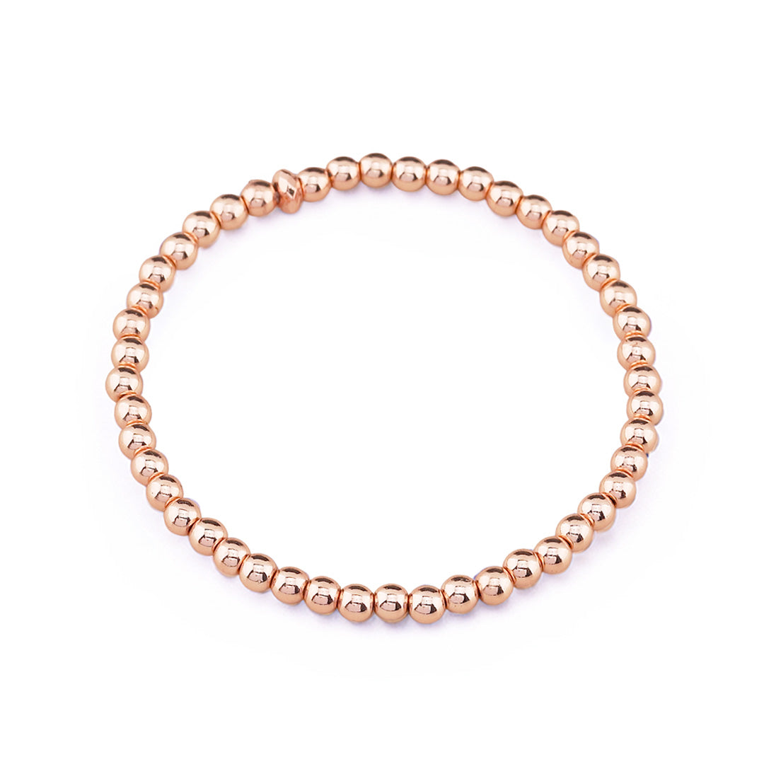 Delicate rose gold hematite stacking bracelet crafted with 4mm gemstone beads. Perfect companion to our beaded gemstone bracelet collection, this minimalist piece layers beautifully for a modern, effortless look.