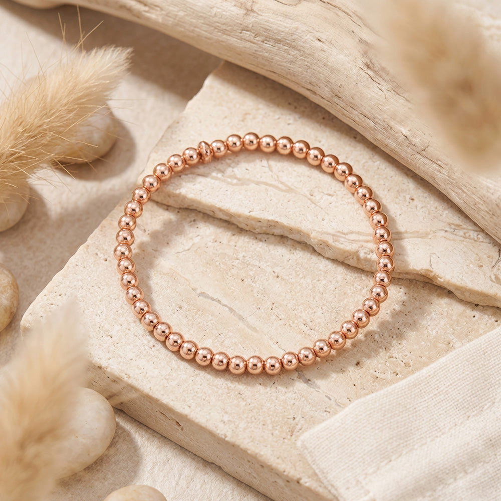 Delicate rose gold hematite stacking bracelet crafted with 4mm gemstone beads. Perfect companion to our beaded gemstone bracelet collection, this minimalist piece layers beautifully for a modern, effortless look.