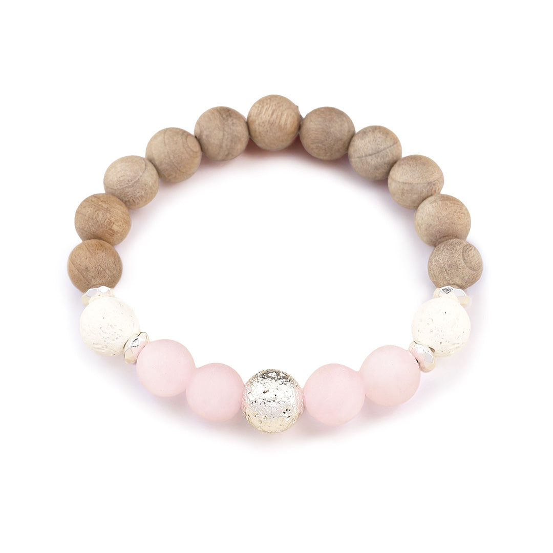 Chunky BOHO Beaded Bracelet - Hand-strung with 10mm frosted rose quartz, white and silver lava stone, burlywood wooden beads, and hematite rondelles for grounding energy. Rose quartz brings gentle, soothing vibes while lava beads anchor mental clarity and stability. The blend of soft pink, earthy neutrals, and silver accents creates a versatile piece that stacks beautifully or stands alone for everyday elegance.