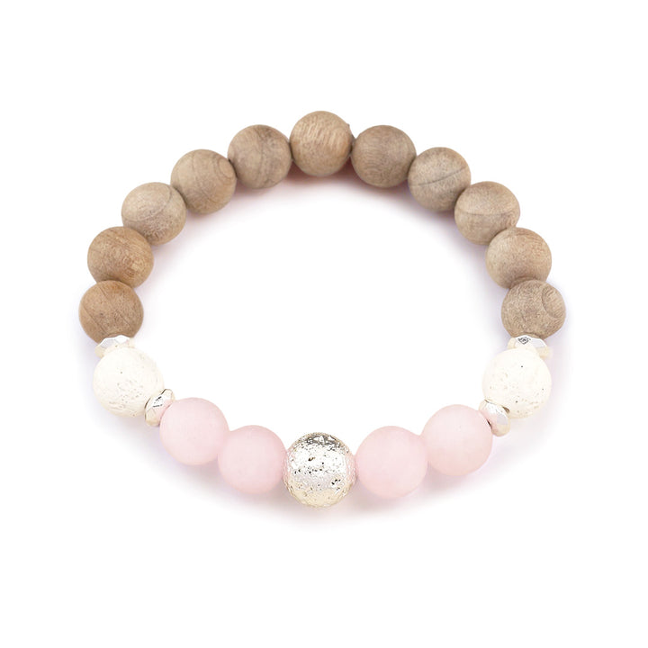 Chunky BOHO Beaded Bracelet - Hand-strung with 10mm frosted rose quartz, white and silver lava stone, burlywood wooden beads, and hematite rondelles for grounding energy. Rose quartz brings gentle, soothing vibes while lava beads anchor mental clarity and stability. The blend of soft pink, earthy neutrals, and silver accents creates a versatile piece that stacks beautifully or stands alone for everyday elegance.