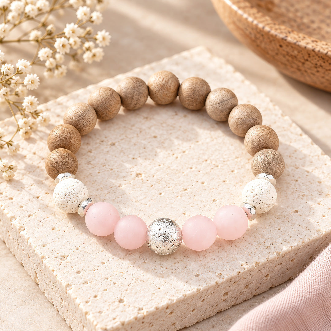 Chunky BOHO Beaded Bracelet - Hand-strung with 10mm frosted rose quartz, white and silver lava stone, burlywood wooden beads, and hematite rondelles for grounding energy. Rose quartz brings gentle, soothing vibes while lava beads anchor mental clarity and stability. The blend of soft pink, earthy neutrals, and silver accents creates a versatile piece that stacks beautifully or stands alone for everyday elegance.