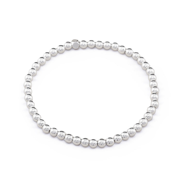 Delicate silver hematite stacking bracelet crafted with 4mm gemstone beads. Perfect companion to our beaded gemstone bracelet collection, this minimalist piece layers beautifully for a modern, effortless look. 