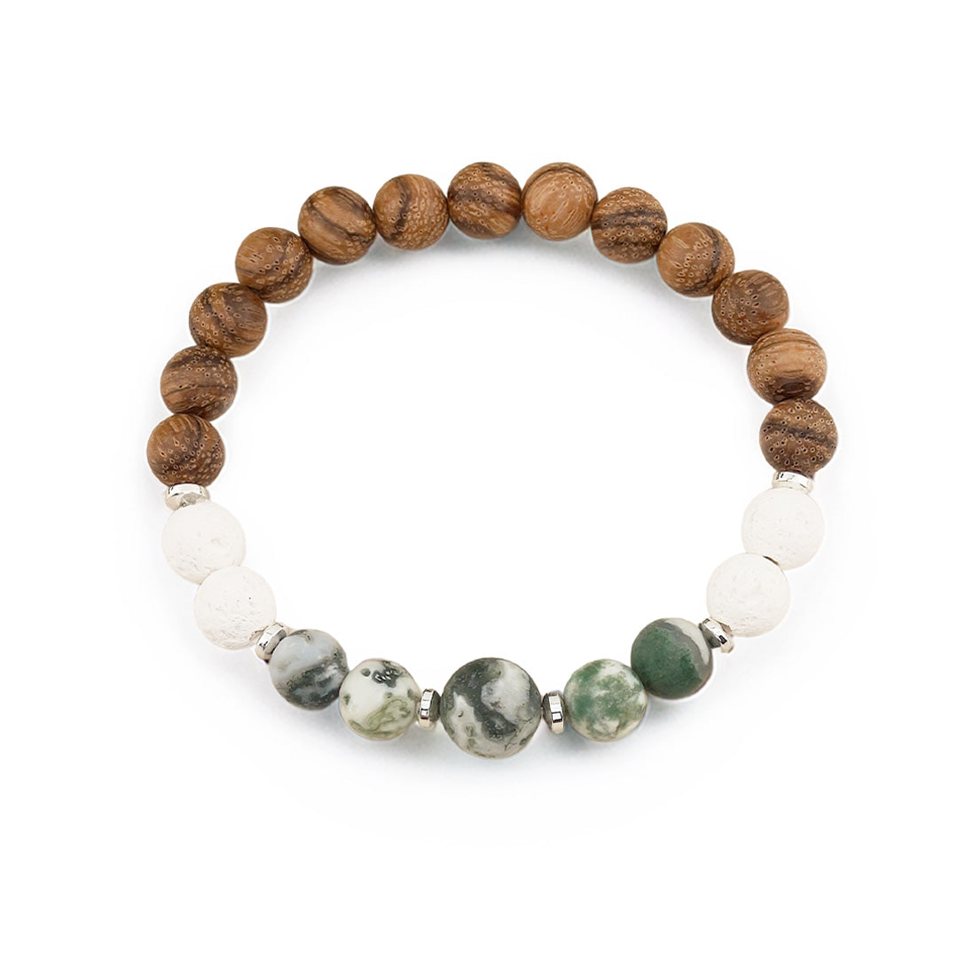 Earthy elegance meets everyday wearability in this handcrafted bracelet. Featuring 8mm rosy brown wooden beads paired with a striking 10mm tree agate focal stone and silver hematite rondelle accents, it captures a grounded, boho aesthetic perfect for any occasion.
