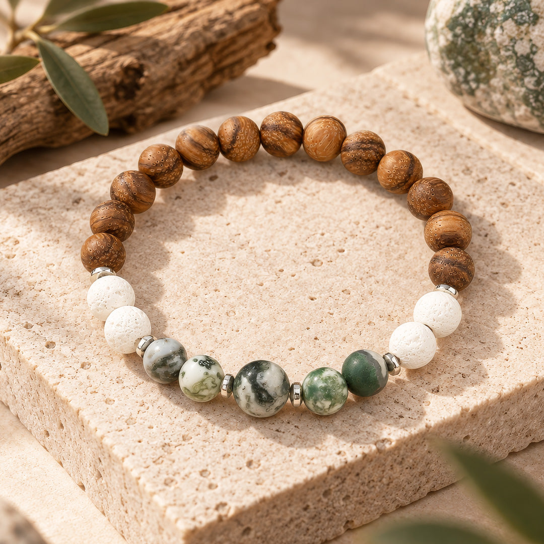 Earthy elegance meets everyday wearability in this handcrafted bracelet. Featuring 8mm rosy brown wooden beads paired with a striking 10mm tree agate focal stone and silver hematite rondelle accents, it captures a grounded, boho aesthetic perfect for any occasion.