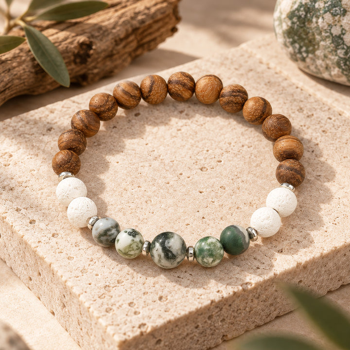 Earthy elegance meets everyday wearability in this handcrafted bracelet. Featuring 8mm rosy brown wooden beads paired with a striking 10mm tree agate focal stone and silver hematite rondelle accents, it captures a grounded, boho aesthetic perfect for any occasion.