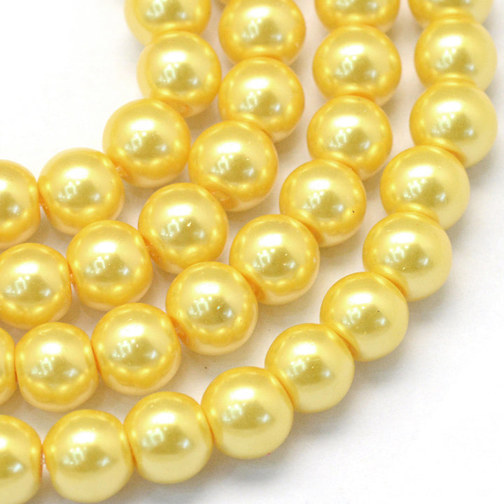 Glass Pearl Beads, Round, Golden Yellow Color Pearls Beads for Jewelry Making.

Size: 4-4.5mm in diameter, hole: 0.8mm, approx. 200-210pcs/strand, 32 inches/strand

Material: The Beads are Made from Glass. Gold Yellow Color, Polished, Shinny Finish