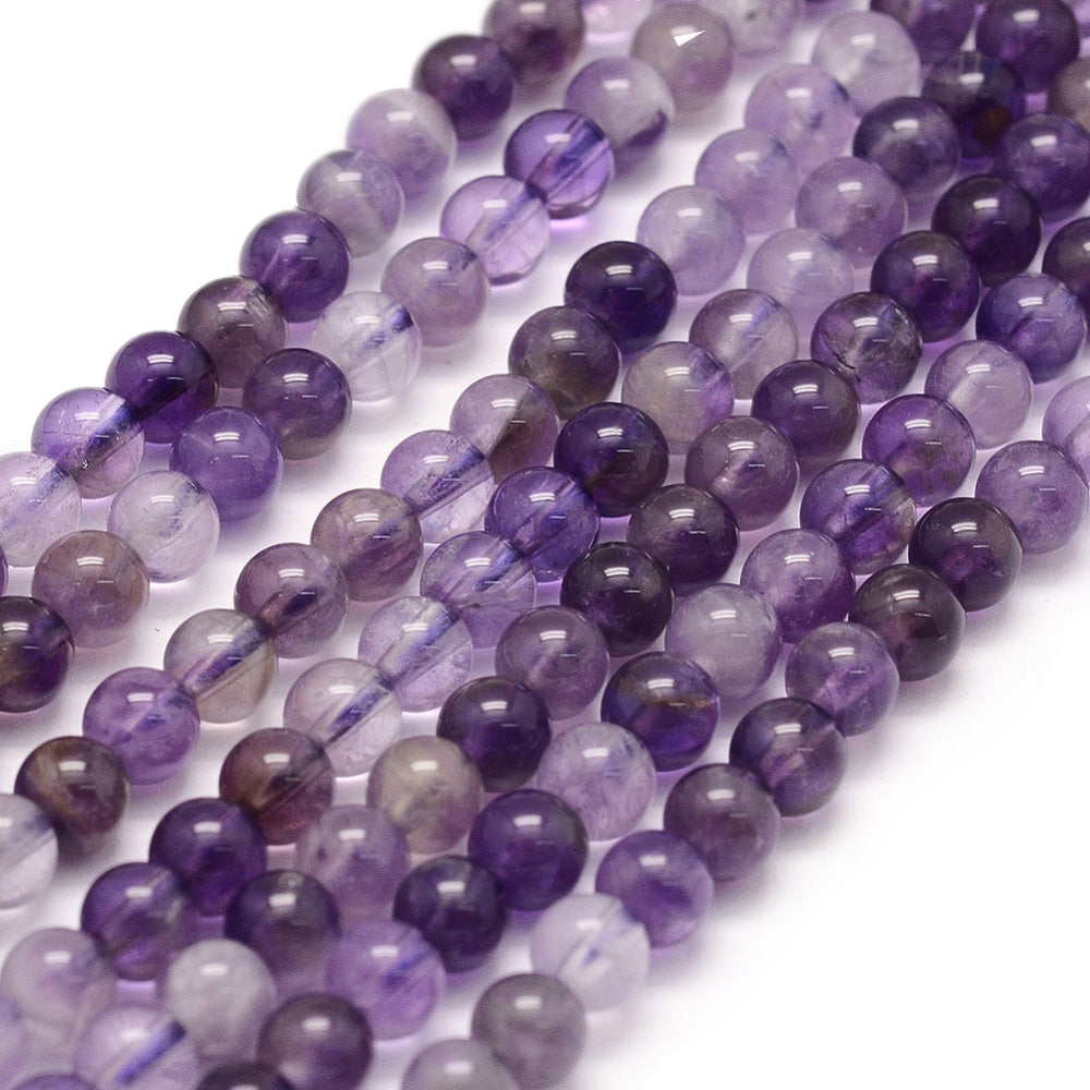 Gorgeous Amethyst Crystal Beads, Round, Purple Color. Semi-Precious Gemstone Beads for DIY Jewelry Making. Gorgeous, High Quality Crystal Beads.  Size: 4-4.5mm Diameter, Hole: 1mm; approx. 85pcs/strand, 14.5" Inches Long.  Material: Genuine Natural Amethyst Beads, High Quality Crystal Beads. Purple Color. Polished, Shinny Finish. 