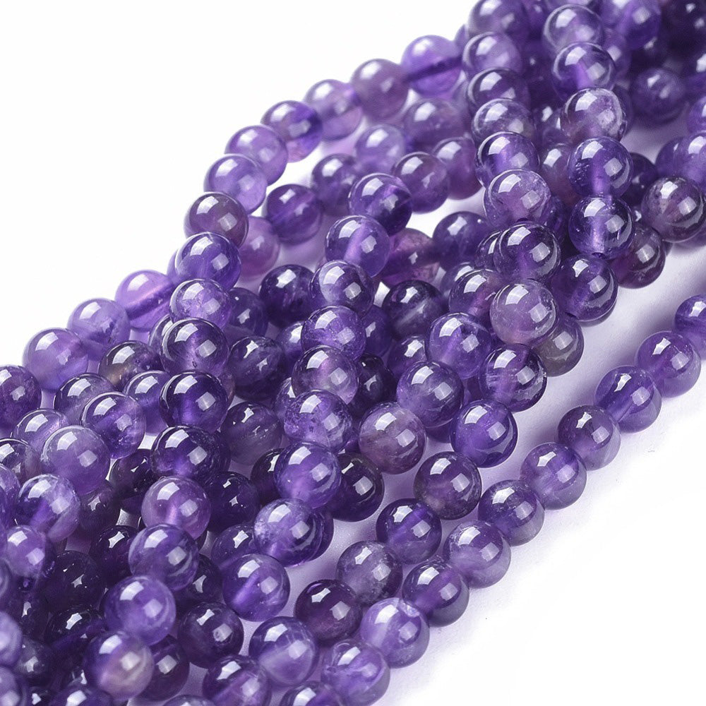 Gorgeous Amethyst Crystal Beads, Round, Purple Color. Semi-Precious Gemstone Beads for DIY Jewelry Making. Gorgeous, High Quality Crystal Beads.  Size: 4mm Diameter, Hole: 0.6mm; approx. 85pcs/strand, 14.5" Inches Long.  Material: Genuine Natural Amethyst Beads, High Quality Crystal Beads. Purple Color. Polished, Shinny Finish. 