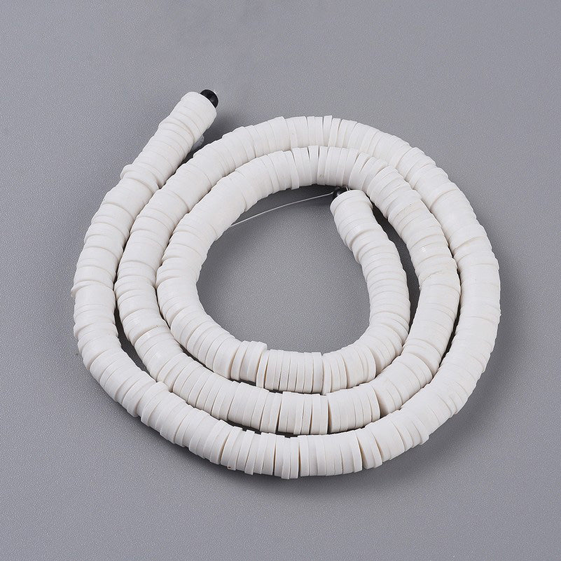 Polymer Clay Beads, Flat Disc Shape, White Color. Polymer Clay Heishi Beads for DIY Jewelry Making. Great for friendship bracelets. Affordable polymer clay beads.  Size: 6mm Diameter, 1mm Thick, Hole: 2mm, approx. 380pcs/strand, 16 Inches Long.  Material: Polymer Clay, Heishi Loose Beads. White Color, Disc Shaped, Lightweight Beads. 