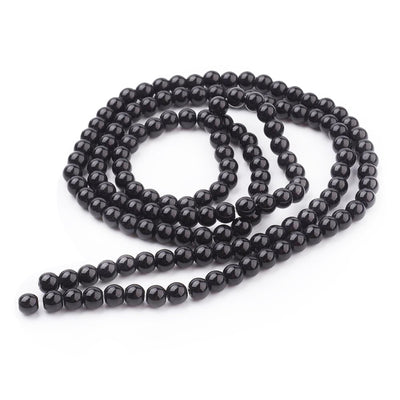 Glass Pearl Bead Strands, Round, Black Color. Shinny, Black Pearl Beads for Jewelry.  Size: 6mm in diameter, hole: 1mm; approx. 135-140pcs/strand, 32" Inches Long.  Material: The Beads are Made from Glass. Glass, Pearlized, Round, Black Color Beads. Polished. Shinny Finish.