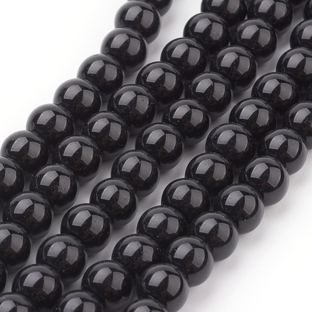 Glass Pearl Bead Strands, Round, Black Color. Shinny, Black Pearl Beads for Jewelry.  Size: 6mm in diameter, hole: 1mm; approx. 135-140pcs/strand, 32" Inches Long.  Material: The Beads are Made from Glass. Glass, Pearlized, Round, Black Color Beads. Polished. Shinny Finish.