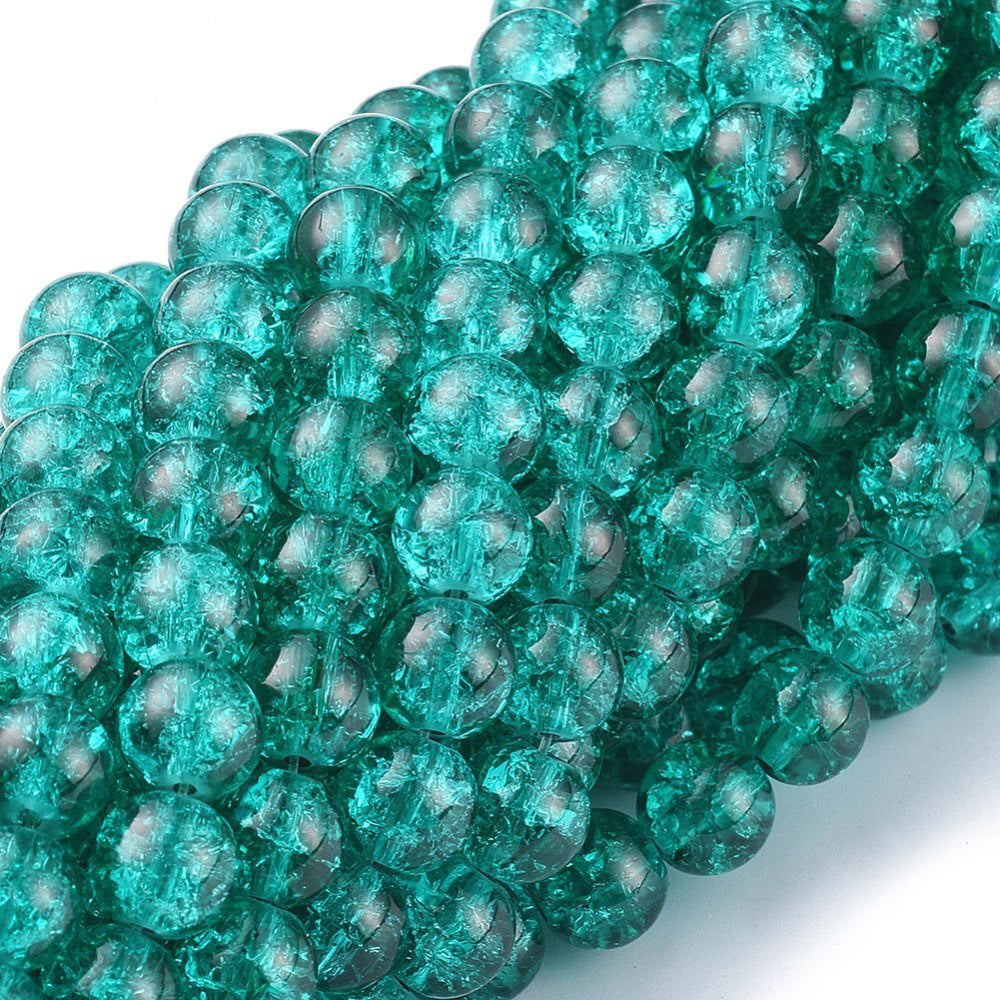 Popular Crackle Glass Beads, Round, Teal Blue/Green Color. Glass Bead Strands for DIY Jewelry Making. Affordable, Colorful Crackle Beads. Great for Stretch Bracelets.  Size: 6mm Diameter Hole: 1.3mm; approx. 125pcs/strand, 31" Inches Long.  Material: The Beads are Made from Glass. Crackle Glass Beads, Bright Teal, Green/Blue  Colored Beads. Polished, Shinny Finish.