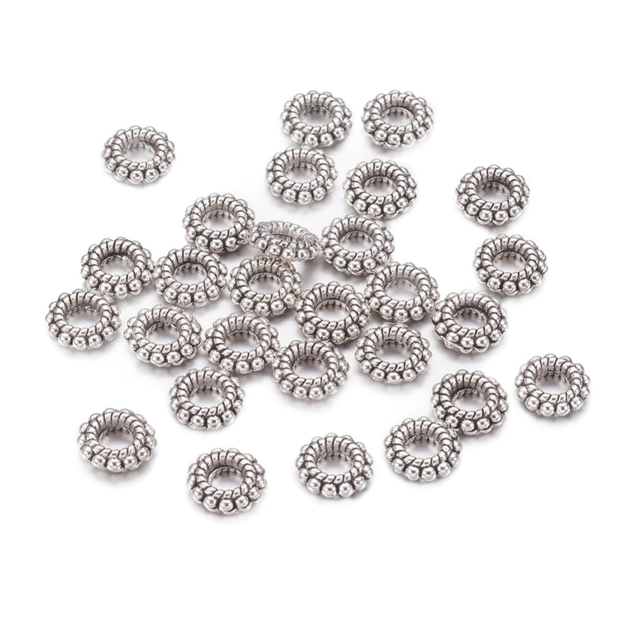 Alloy Spacer Beads, Donut, Silver Color for DIY Jewelry Making Projects.  Size: 8mm Diameter, 2mm Thick, Hole: 1mm, approx. 20 pcs/package.  Material: Tibetan Alloy Spacers. Silver Color Spacer Beads. Cadmium, Lead and Nickel Free.