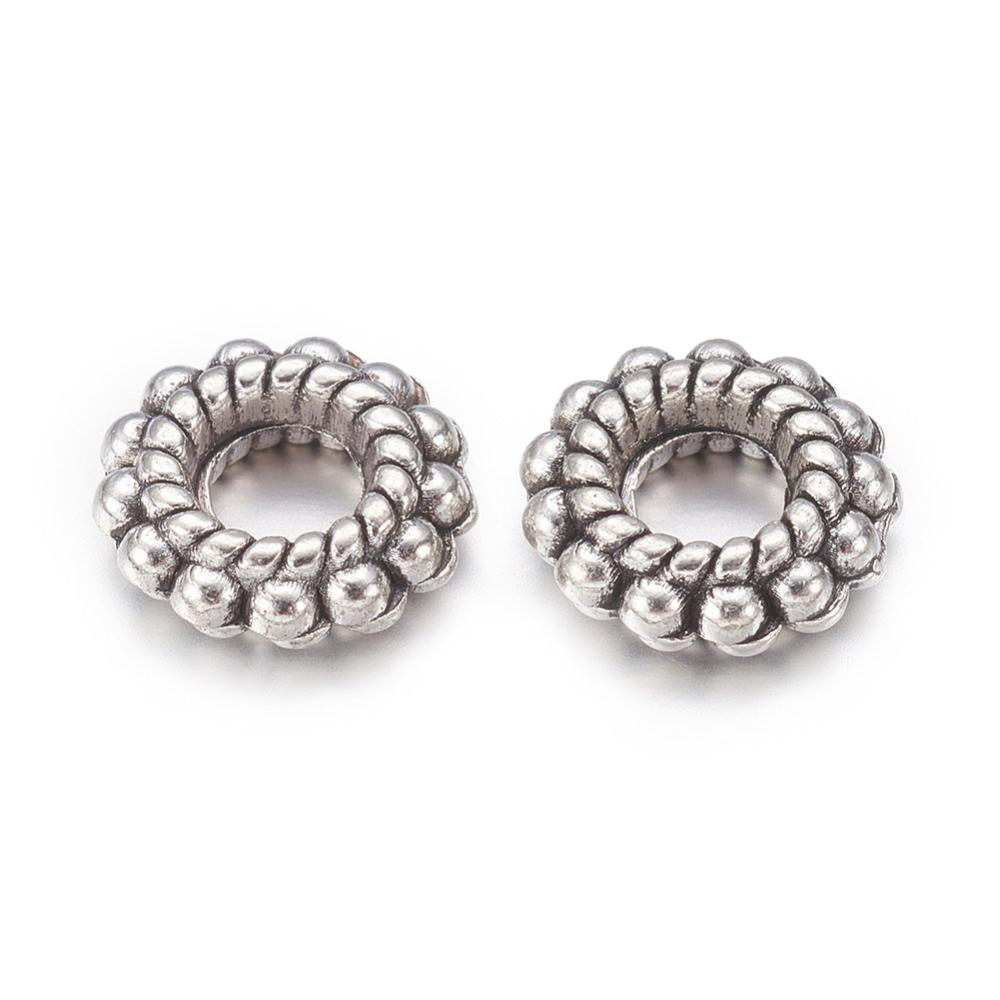 Alloy Spacer Beads, Donut, Silver Color for DIY Jewelry Making Projects.  Size: 8mm Diameter, 2mm Thick, Hole: 1mm, approx. 20 pcs/package.  Material: Tibetan Alloy Spacers. Silver Color Spacer Beads. Cadmium, Lead and Nickel Free.