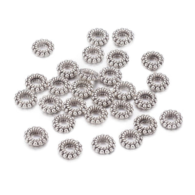 Alloy Spacer Beads, Donut, Silver Color for DIY Jewelry Making Projects.  Size: 8mm Diameter, 2mm Thick, Hole: 1mm, approx. 20 pcs/package.  Material: Tibetan Alloy Spacers. Silver Color Spacer Beads. Cadmium, Lead and Nickel Free.