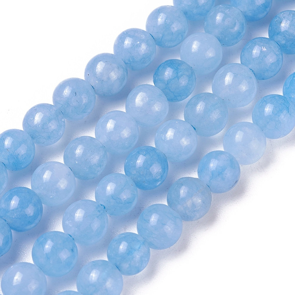 Stunning Aquamarine Natural Jade Beads, Round, Light Blue Color. Semi-Precious Crystal Gemstone Beads for Jewelry Making. Great for Stretch Bracelets. Size: 6mm in Diameter, Hole: 1mm; approx. 60pcs/strand, 14.75" Inches Long. Material: Imitation Aquamarine Beads made from Natural Jade dyed Blue Color. Polished, Shinny Finish. bead lot, beads and more. beadlotcanada beads. www.beadlot.com