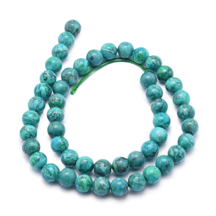 African Turquoise Jasper Beads, Round, Dark Cyan Color. Semi-Precious Stone Jasper Beads for Jewelry Making. Great Beads for Stretch Bracelets due to its Durability.  Size: 6mm Diameter, Hole: 1mm; approx. 61pcs/strand, 15" inches long.  Material: African Turquoise Jasper. Dyed Dark Cyan Color. Polished, Shinny Finish.