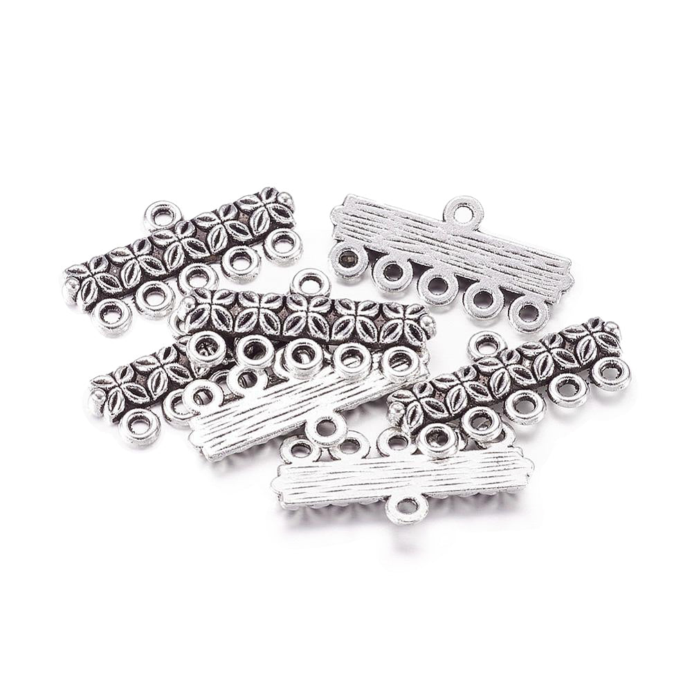 Chandelier Alloy Link Connectors, Chandelier 5 strand Reducer Connector. Antique Silver Colored Connector for DIY Jewelry Making.   Size: 25mm Length, 12mm Width, 3mm Thick, Hole: 1.5mm, Quantity: 4pcs/bag.  Material: Alloy (Lead and Cadmium Free) Connectors, Links.. Antique Silver Color. Shinny Finish.