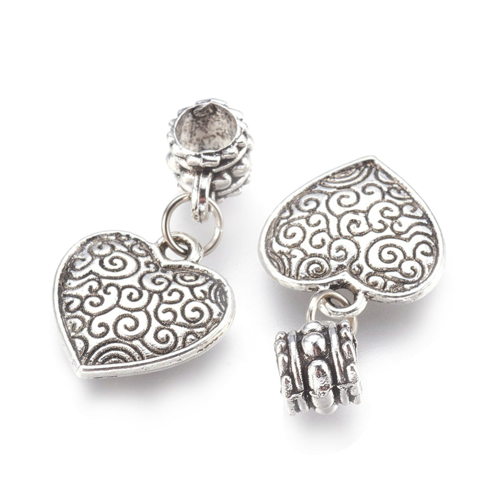 Antique Silver Alloy European Dangle Charms, Heart Charms for Jewelry Making.  Size: Pendant: 16x15mm, with Bail the size is 27mm,  Hole: 5mm, Qty: 1pcs/package.   Material: Alloy Heart Shaped Charms. Silver Color with Bail and Jump Ring. Cab be used as a Charm or as a Pendant.